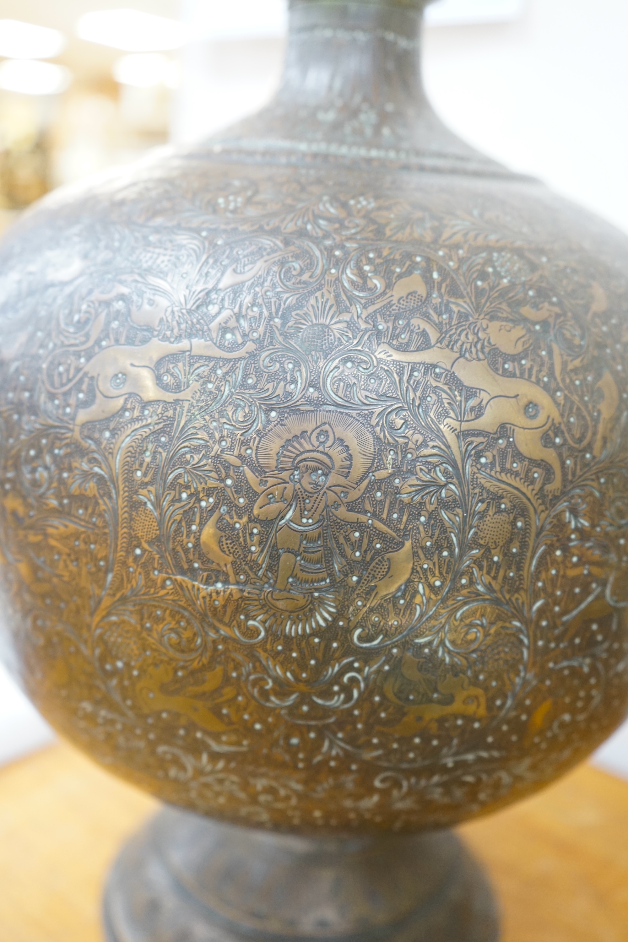 A large Indian repoussé work brass vase, 62cm high. Condition - good